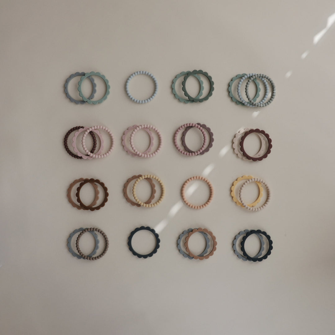 3 mordedores-pulseira pérolas Lilac/Cyan/Soft Peach Teether mushie