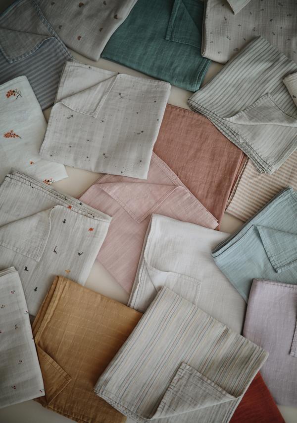 Muslin swaddle sage mushie muslin mushie