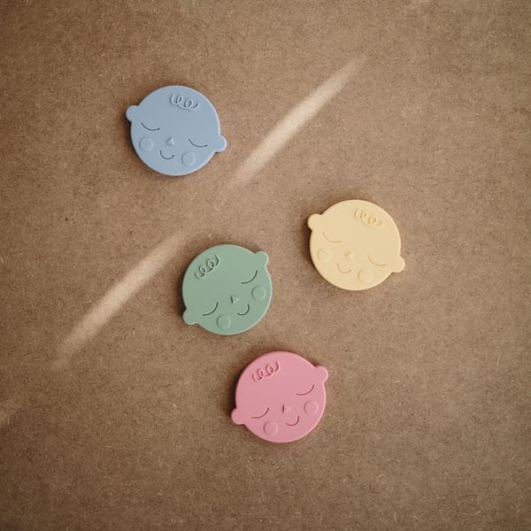 Teether face pistachio mushie Teether mushie