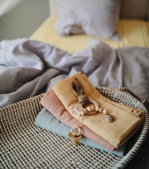 Muslin swaddle soft mauve mushie muslin mushie