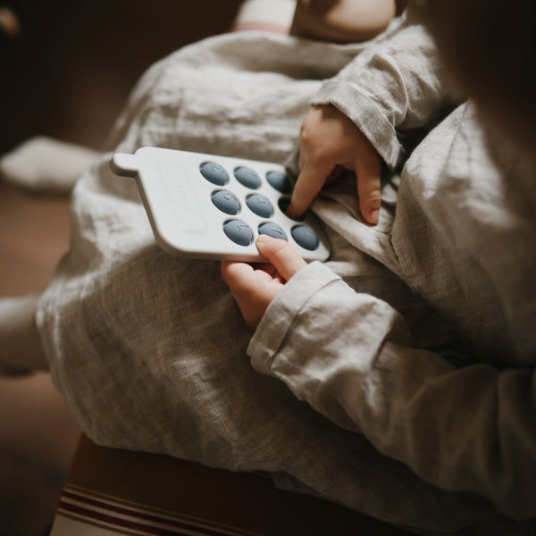 Phone press toy tradewinds mushie Toys mushie