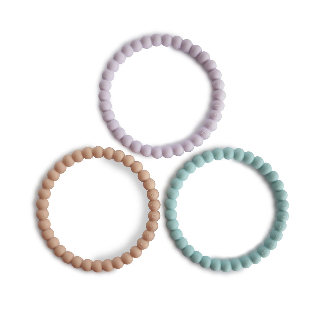 3 mordedores-pulseira pérolas Lilac/Cyan/Soft Peach Teether mushie