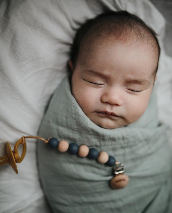 Muslin swaddle roman green mushie muslin mushie